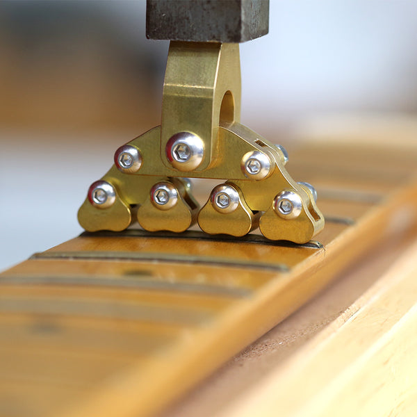 Guitar fractal fret press tool